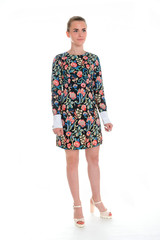 pretty young girl wearing a flower printed dress