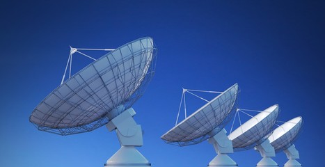 Array of satellite dishes or radio antennas against blue sky. 3D rendered illustration.