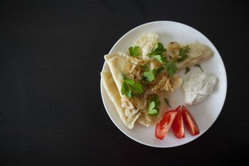 top view of the plate of dumplings
