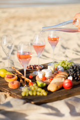 Refreshing  Rosa Wine in a Glass . Beach Cheers Celebration Friendship Summer Fun Dinner Concept.