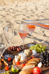 Refreshing  Rosa Wine in a Glass . Beach Cheers Celebration Friendship Summer Fun Dinner Concept.