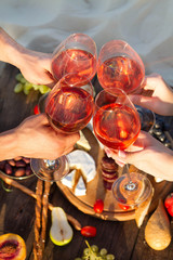 Refreshing  Rosa Wine in a Glass . Beach Cheers Celebration Friendship Summer Fun Dinner Concept.