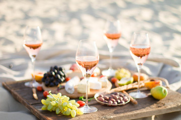 Refreshing  Rosa Wine in a Glass . Beach Cheers Celebration Friendship Summer Fun Dinner Concept.