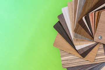 Samples of laminate or furniture isolated on green