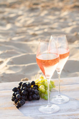 Refreshing  Rosa Wine in a Glass . Beach Cheers Celebration Friendship Summer Fun Dinner Concept.