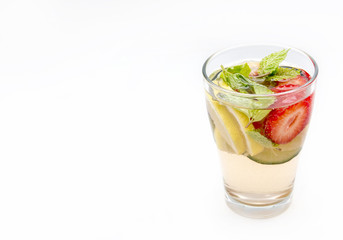 Dietary detox drink with lemon juice, strawberries and cucumber.