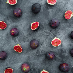 Pattern made of figs on dark background. Flat lay, Top view