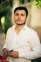 Fototapeta premium Handsome young man on nature background
