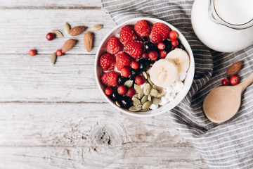 Cottage cheese with berries and nuts for breakfast