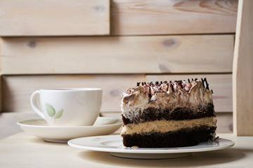 Chocolate cake and cup of tea