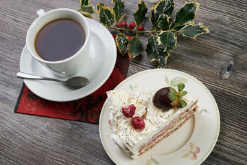 Sliced white Christmas cake with whipped cream