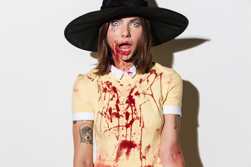 Close up image of frightening woman in halloween costume