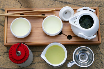 Top view. Cup set brown coffee and dishware.