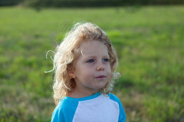 Small child enjoying of a sunny day