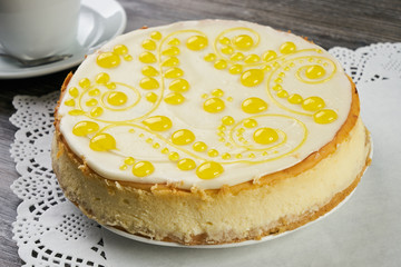Lemon cheesecake with a cup of tea