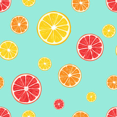 Citrus fruits pattern with blue greenish background.