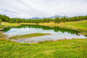 View of Lake Lod near the village of Chamois in Val D'Aosta, Italy;