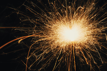 Side Angle View Of Sparkler During Night