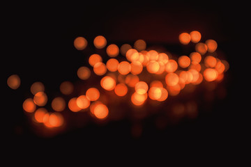 Abstract Close-Up Of Intricate Defocused Orange Christmas Lights Resembling Chinese Lanterns Taken With Helios 44-2 Vintage Lens During Night