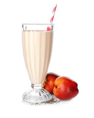Glass of delicious smoothie with chia seeds and peaches, isolated on white