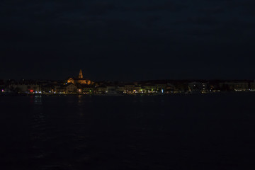 Fototapeta na wymiar Biograd in Croatia mediteranian city shot at night over sea