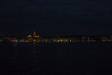 Naklejka premium Biograd in Croatia mediteranian city shot at night over sea