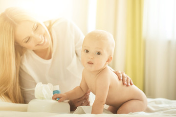 Portrait of happy mother with infant son