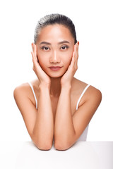 Portrait closeup of beautiful Asian woman face with clean skin