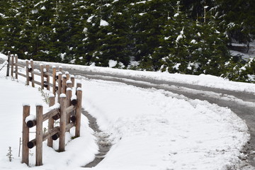 Bad weather conditions on winter - road under snow