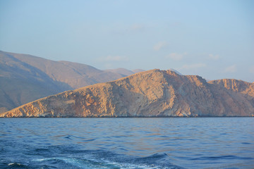 Oman sunset sea mountains