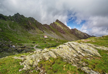 Mountain landscape. Rocks in the foreground. Romanian Carpathians.