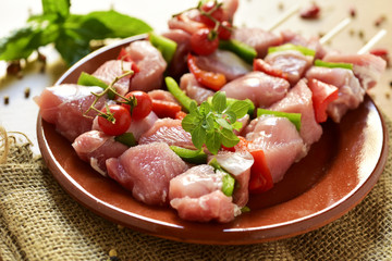 raw turkey meat and vegetables skewers