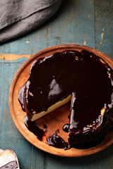 Sweet cheesecake on rustic table