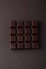 Dark chocolate on dark background