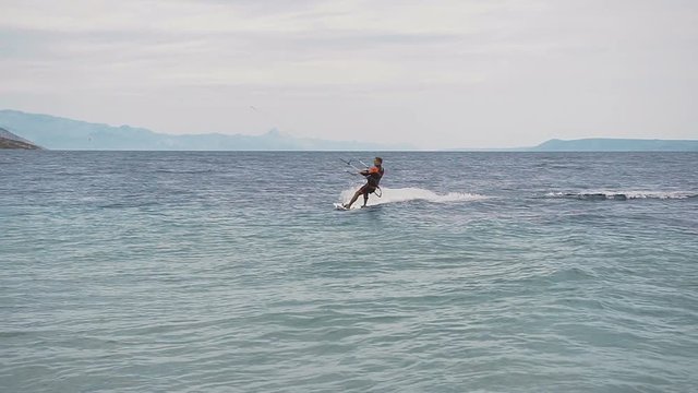 Kite surfer rides on the waves of the Adriatic Sea. Croatian