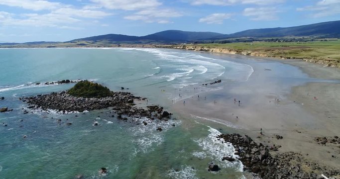 New Zealand aerial drone footage of coast and beach nature landscape at Te Waewae Bay by Orepuki in the Southland region of the south island of New Zealand.