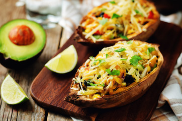 Black bean avocado corn stuffed sweet potatoes