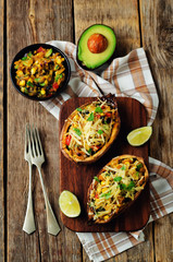 Black bean avocado corn stuffed sweet potatoes