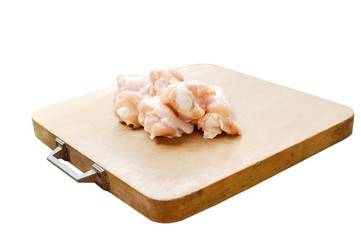  raw chicken drumsticks on wooden cutting board
