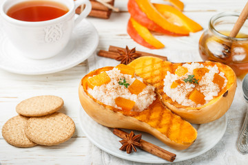 Rice porridge with pumpkin, honey and cinnamon. Healthy Breakfast. Selective focus
