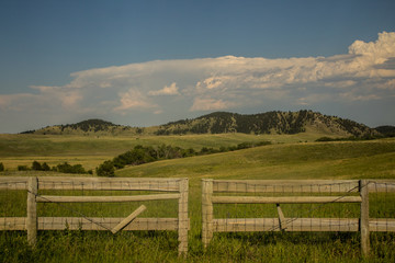 Fototapeta na wymiar Custer State Park Prairie, Sky, Clouds, and Fence