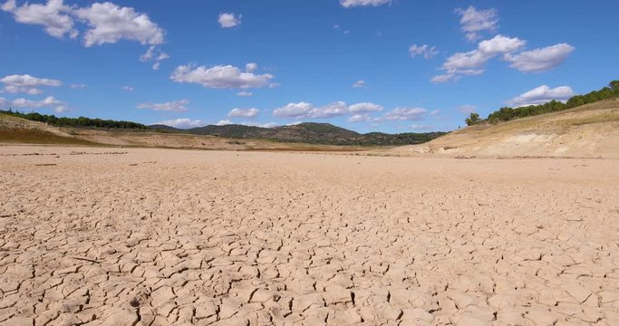 4k video. Timelapse with landscape of dry earth ground and horizon, in Entrepenas reservoir, in Guadalajara, Castilla, Spain Europe
