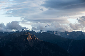 mountain range in the alps in the evening
