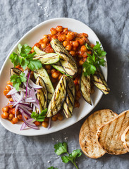 Braised chickpeas in tomato sauce, grilled eggplant and zucchini, grilled bread - a delicious appetizer or snack. Vegetarian food