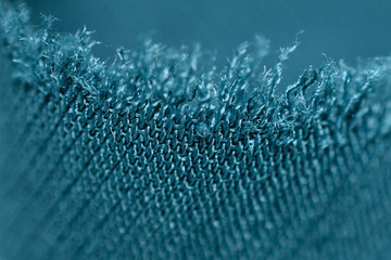 Extreme Close-Up Of Dark Turquoise Woven Fabric