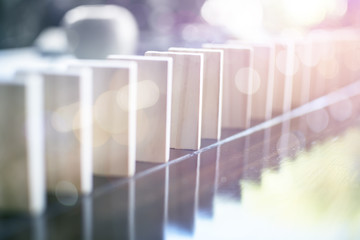 Planning, risk and strategy in business, businessman gambling placing wooden block