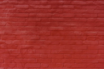Brick wall painted red for background or texture