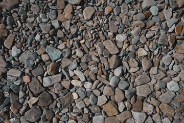 Beautiful flat stones on the seashore. Gorgeous background
