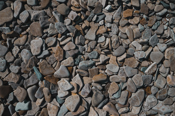 Beautiful flat stones on the seashore. Gorgeous background