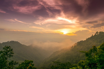 View Orange purple  Sunset shine on sky and and mountain in evening time at Samoeng Forest Viewpoint chiangmai , thailand